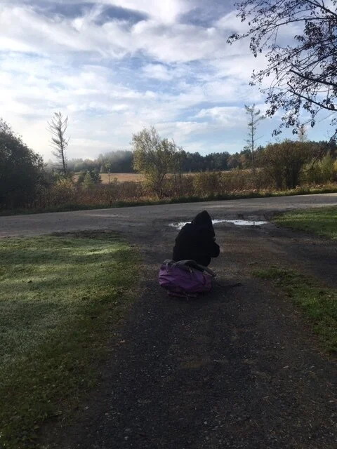  Waiting for the bus on a cool morning. 